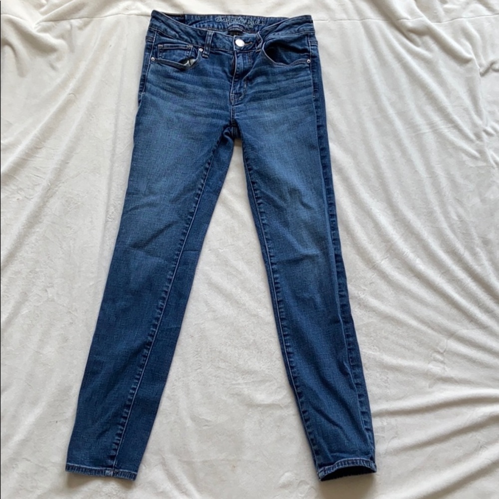 american eagle medium wash “super stretch”  jeans